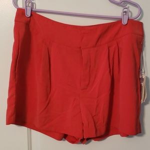 Jennifer Lopez Coral dress/club shorts